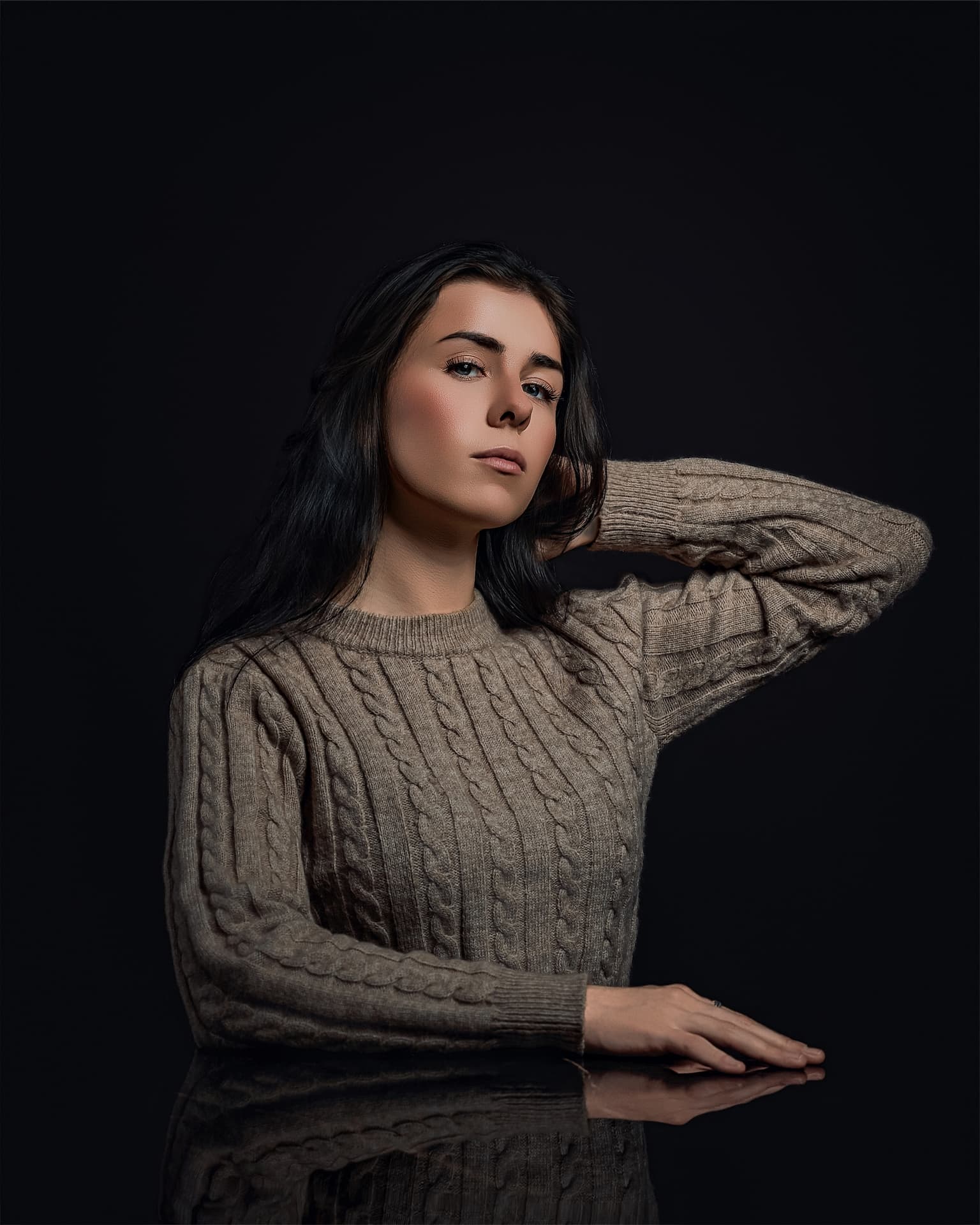 Dark editorial portrait photographed by LucidLens Studio